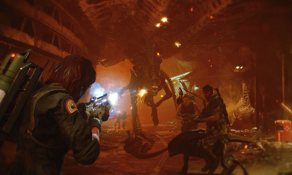 Marines shooting a giant alien.